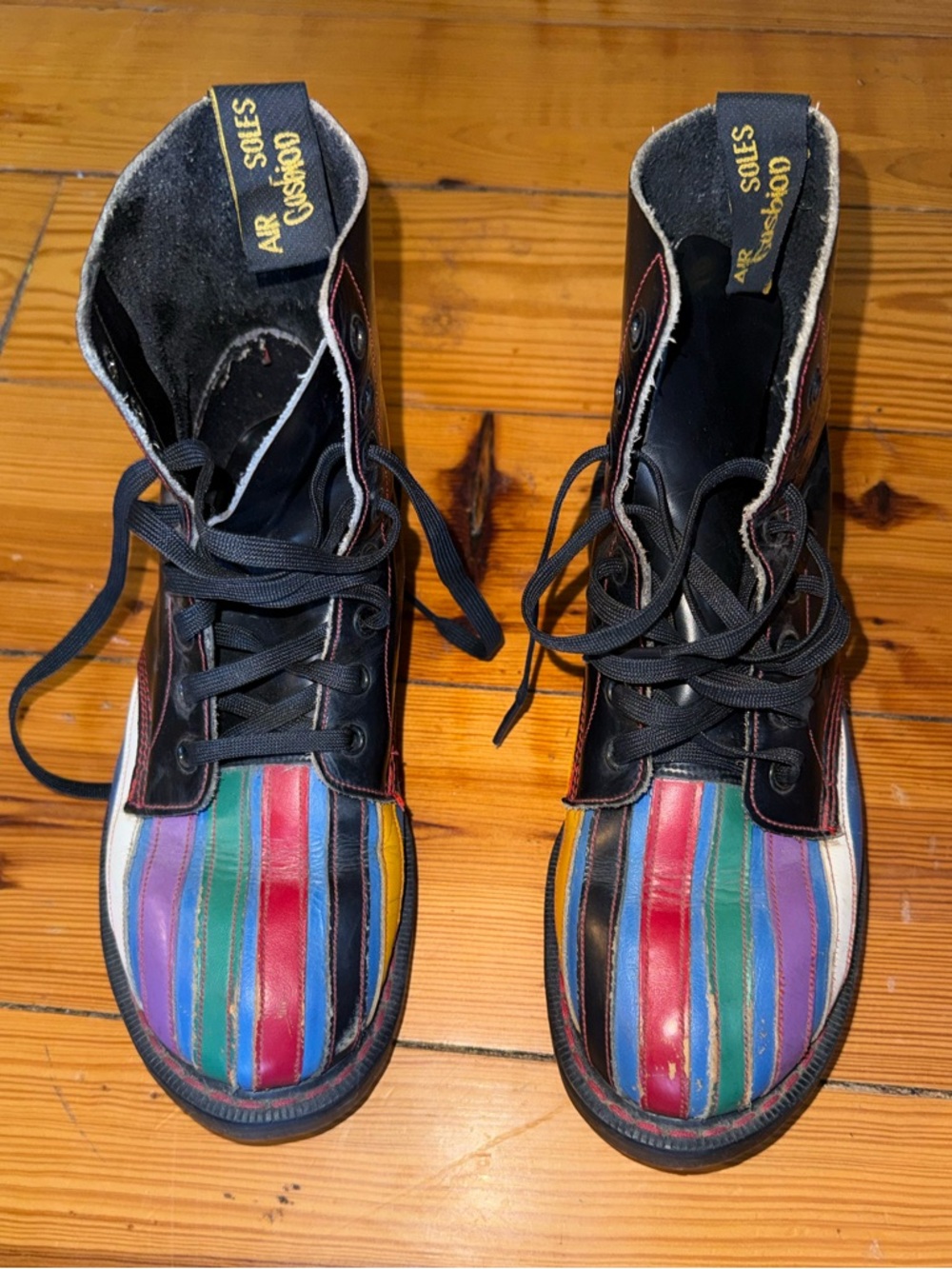Dr. Martens Black Leather Combat Boots with Multicolor Striped Toes